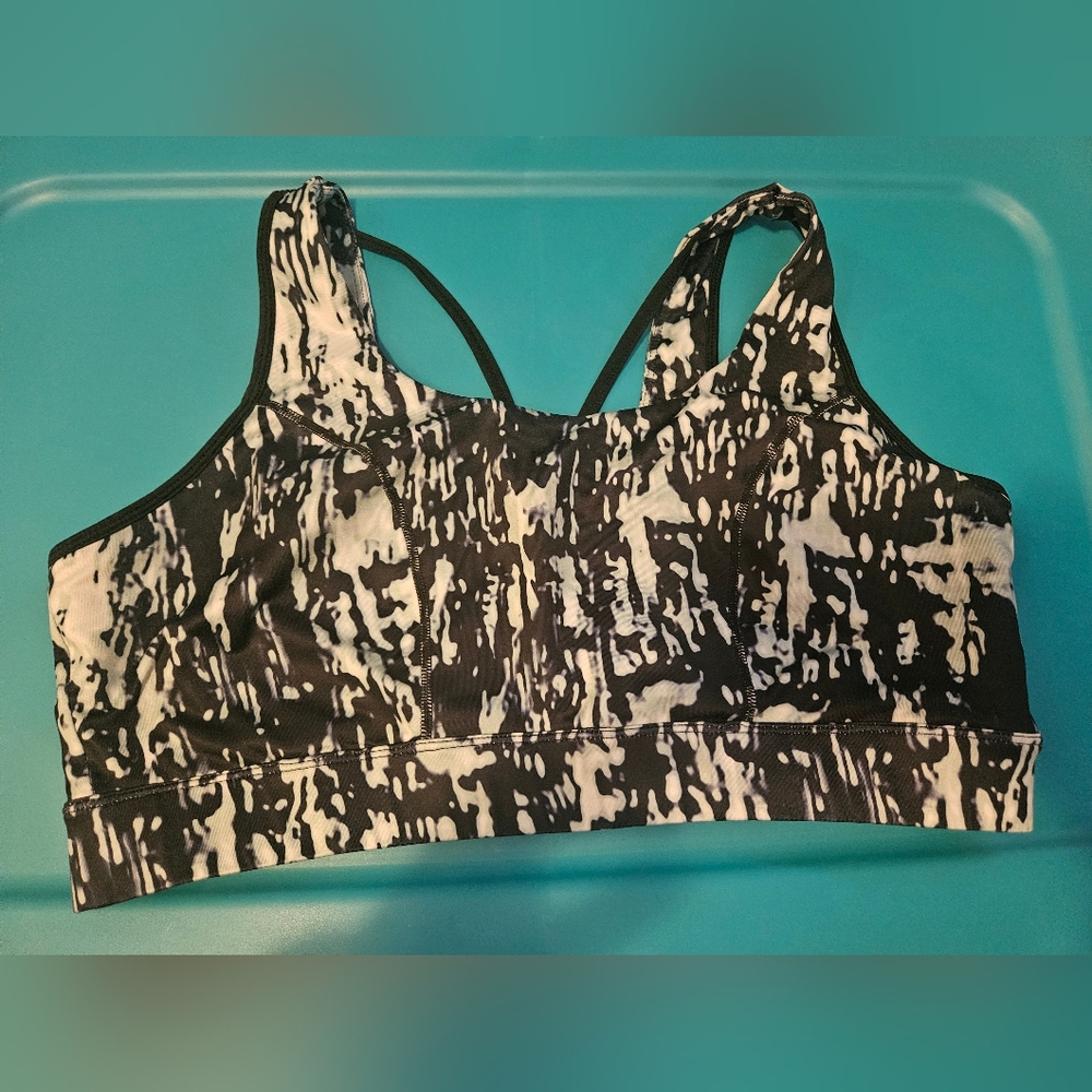 Green and black sports bra
